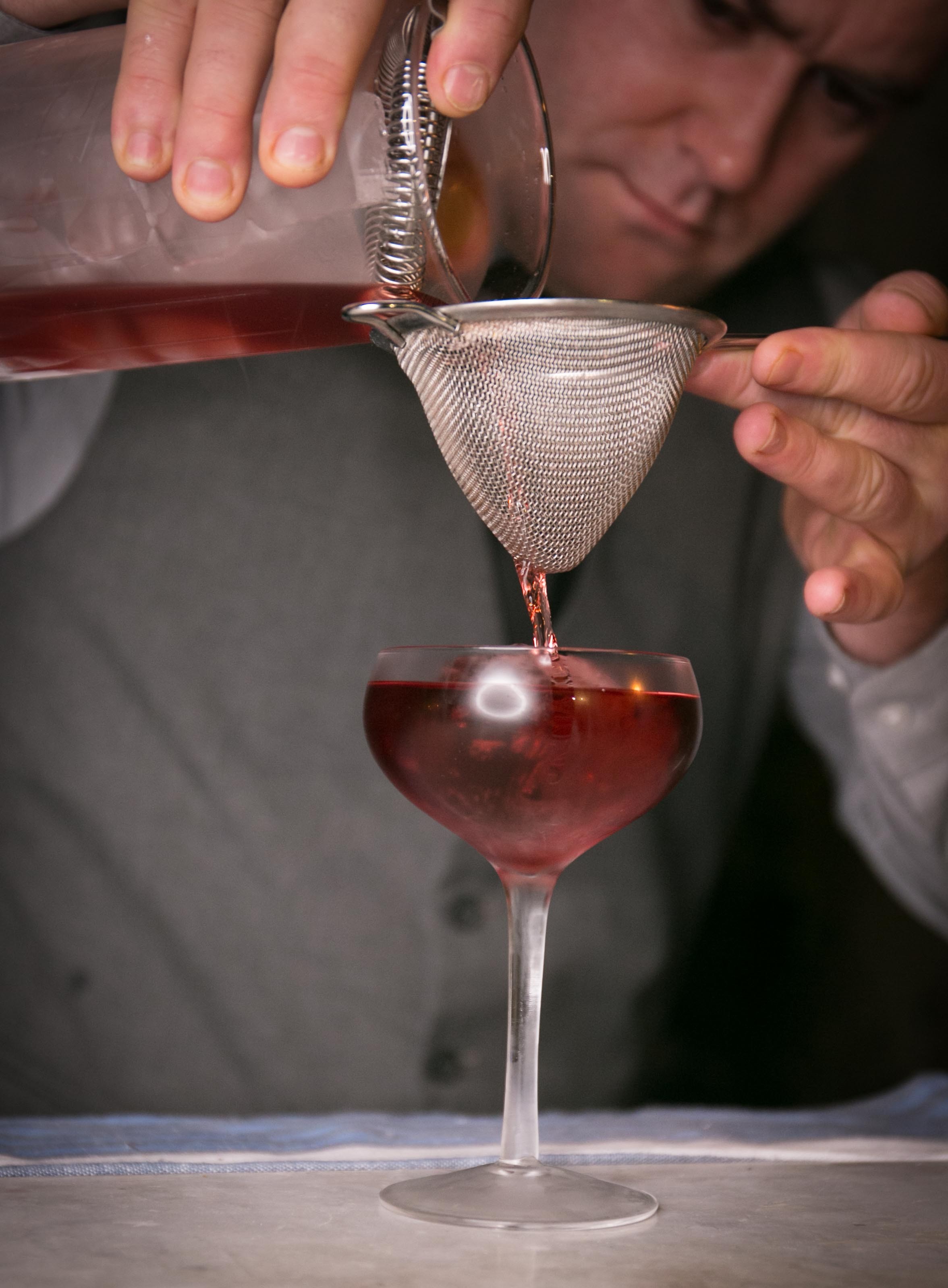 A cocktail strained into a stemmed glass